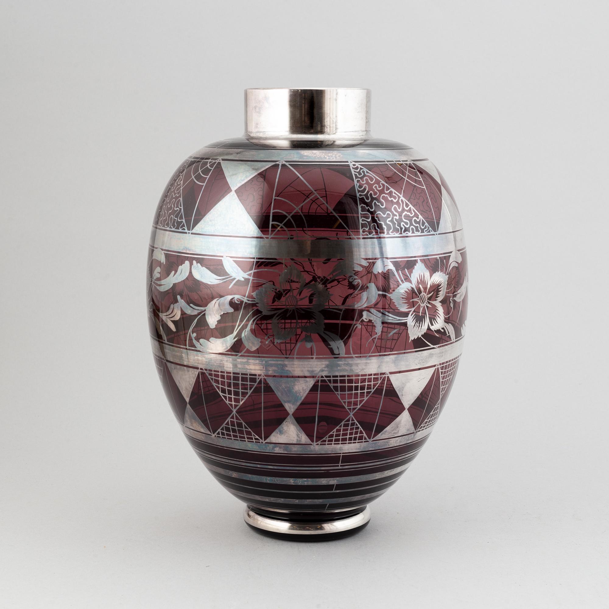 A large glass vase, probably Murano, Italy.