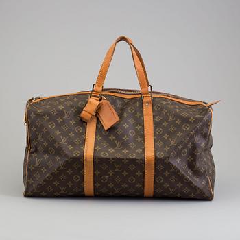 a LOUIS VUITTON "Sac Souple 55" weekend bag.