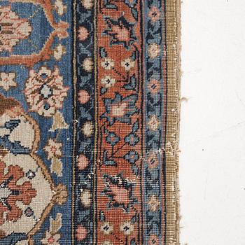 An Antique Tabriz carpet, Northwest Persia (Iran), signed Alabaf c 387 x 299 cm.