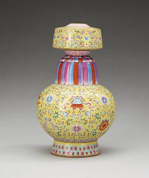 A 'famille rose' yellow-ground altar vase, presumably Republic with Qianlongs seal mark in red.