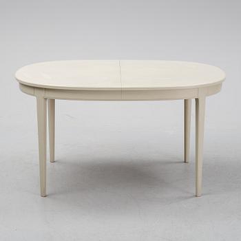 A dining table and six chairs by Carl Malmsten for Bodafors.