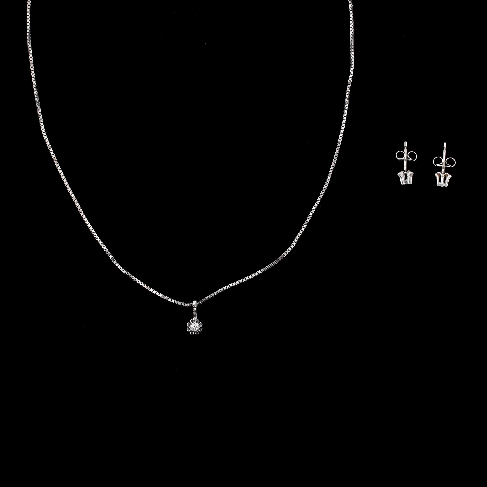 HÄNGE med HALSKEDHA samt ÖRHÄNGEN, ett par, 18k vitguld med briljantslipade diamanter tot ca 0.18 ct. Tot vikt 4,8 g.