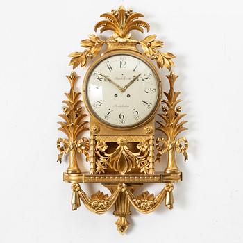 A Gustavian wall clock signed by Jacob Koch (active in Stockholm, 1762-1805).