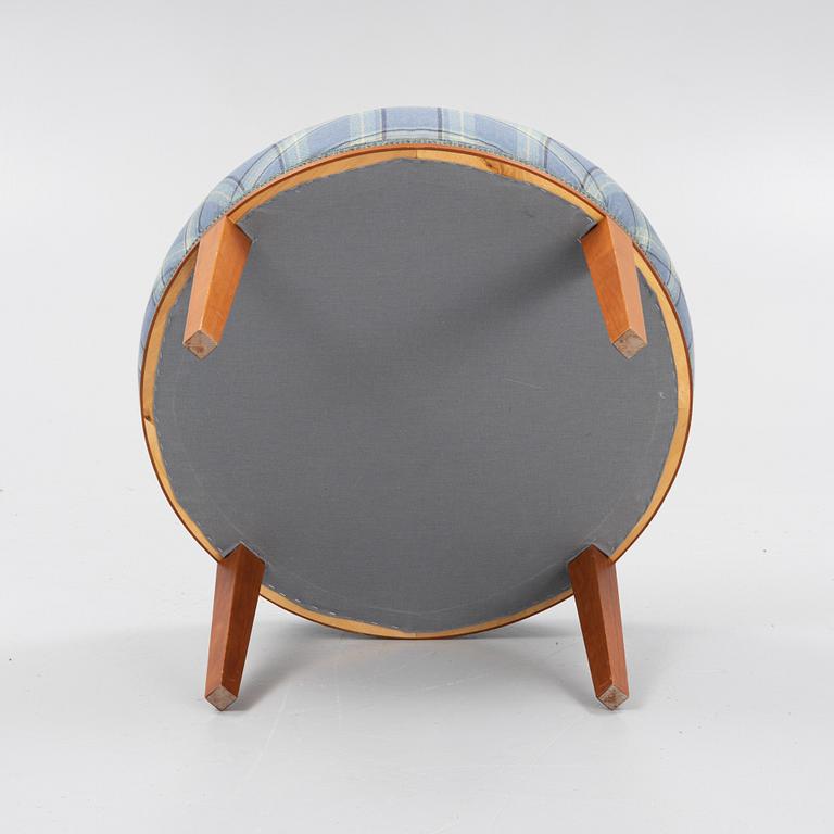 Josef Frank, a model 647 cherry wood stool by Firma Svenskt Tenn.