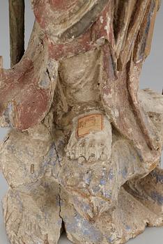A wooden sculpture of Guanyin, Ming dynasty (1368-1644).