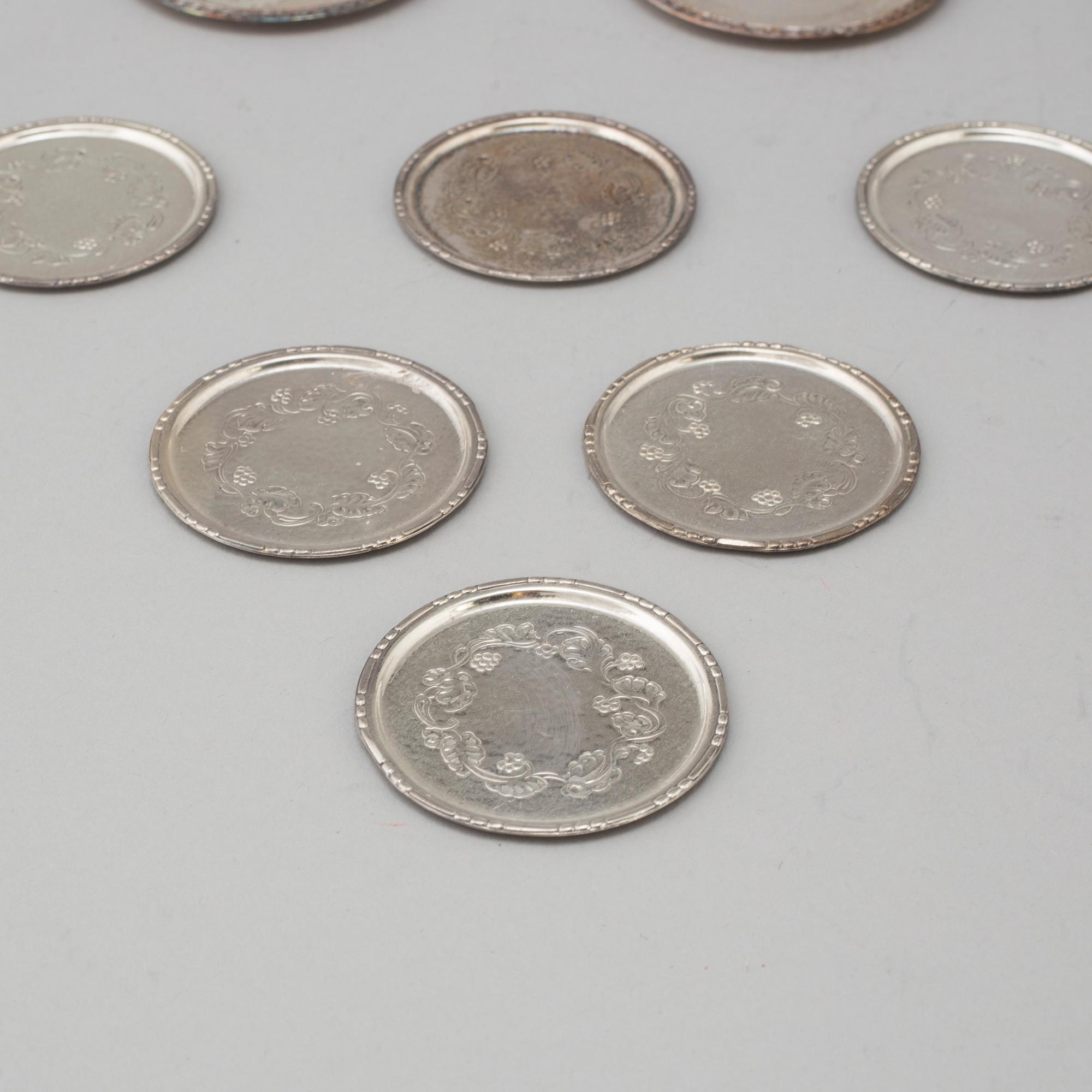 GLASUNDERLÄGG/COASTERS, 11 st, silver. Georg Jensen, sterling, Danmark respektive GAB, Stockholm, 1963-5.