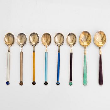 Eight gilt silver and enamel mocha spoons of which 6 by David Andersen, Norway, and 2 by Tillander, Finland.