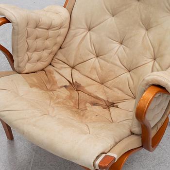 Bruno Mathsson, armchair with footstool, "Pernilla", DUX, late 20th century.