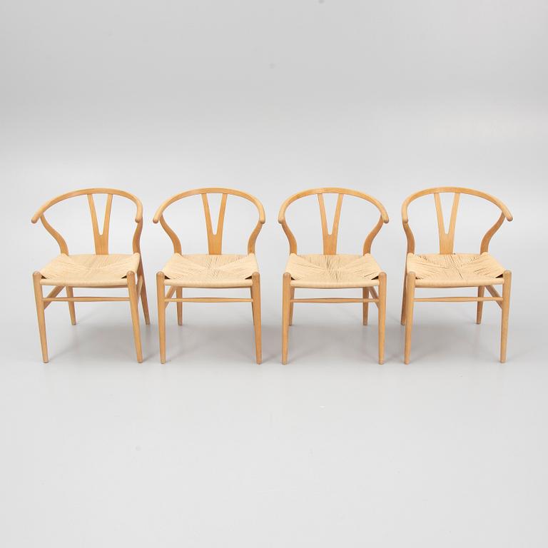 Hans J. Wegner, a set of four model 'CH-24' chairs, Carl Hansen & Søn, Denmark.