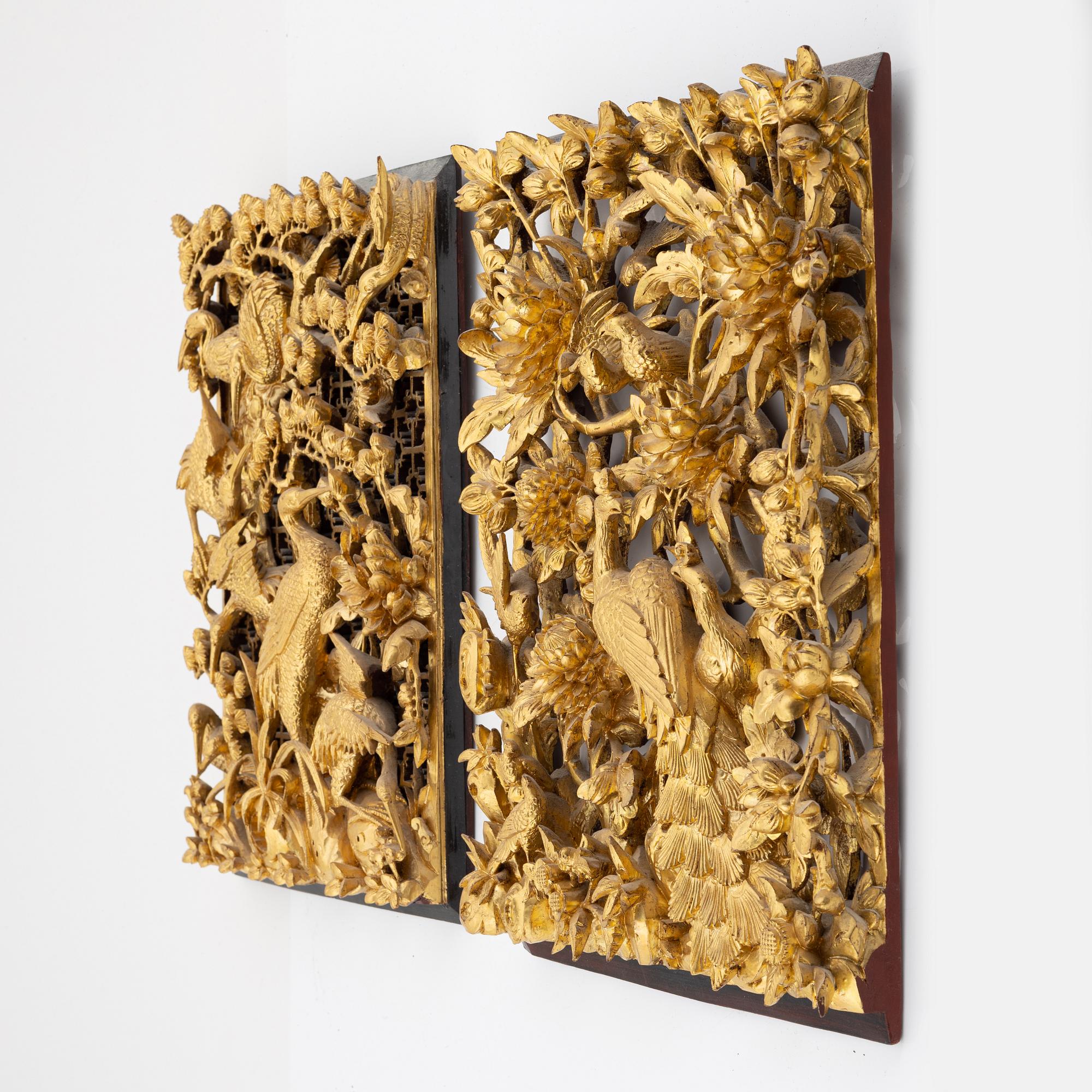 Two carved gilded wooden panels, Qing dynasty, circa 1900.
