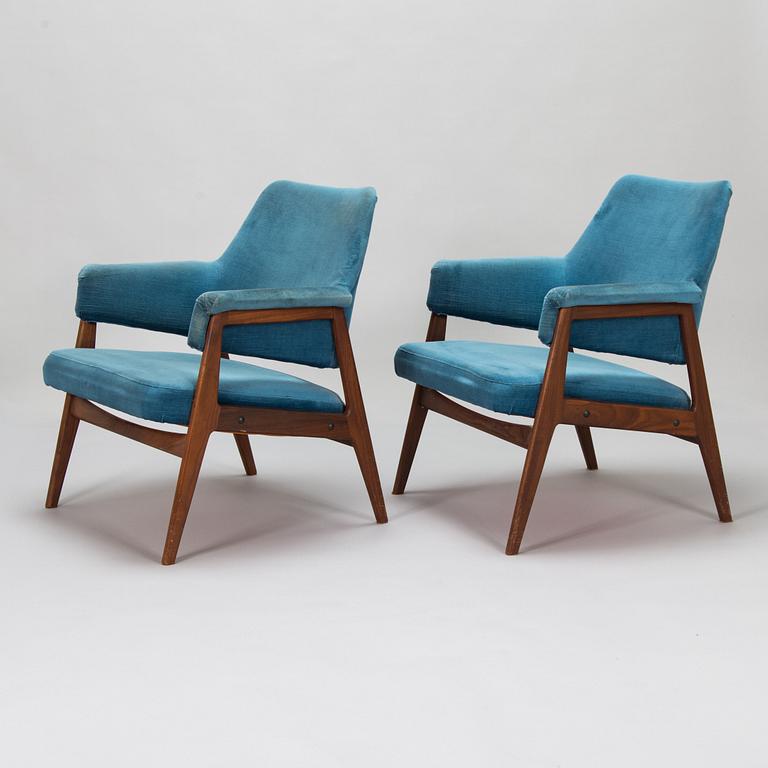 A pair of mid 20th century armchairs.