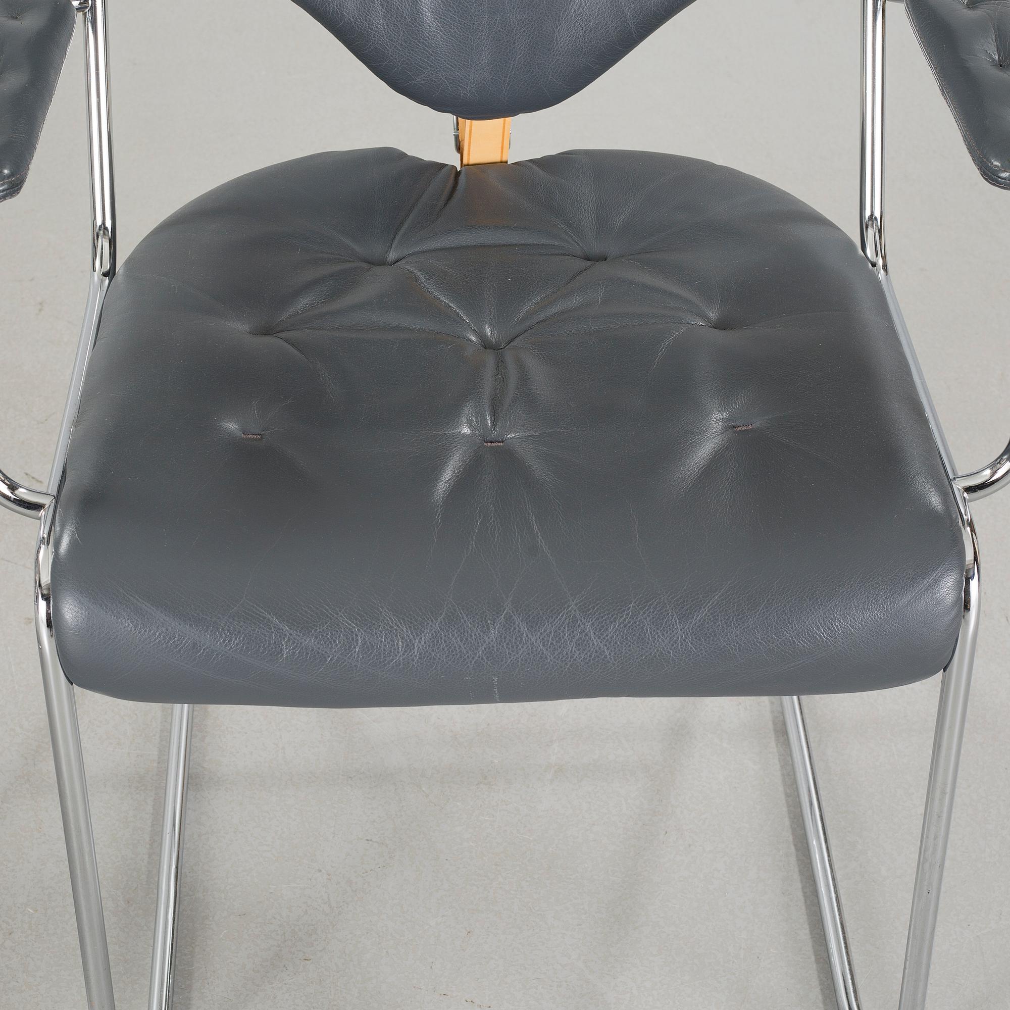 A pair of chairs by Sam Larsson for Dux, designed in 1974.