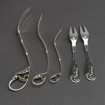 A Danish 20th century sterling 7 pcs serving kit, mark of G Jensen Copenhagen first half of the 20th century.