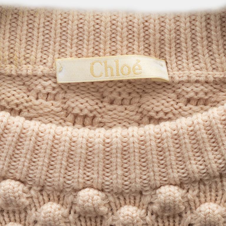 Chloé, a wool sweater, size S.