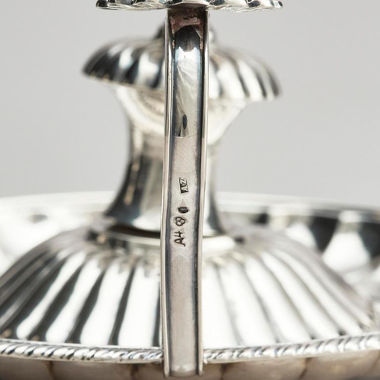 A pair of Swedish 19th century silver chamber-candlesticks, marks of Adolf Zethelius, Stockholm 1831.