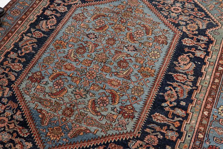 A carpet, semi-antique Hamadan, c. 199 x 128 cm.