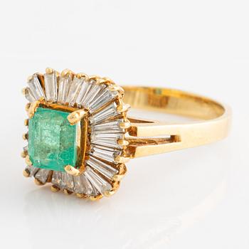 Ring with emerald and baguette-cut diamonds.