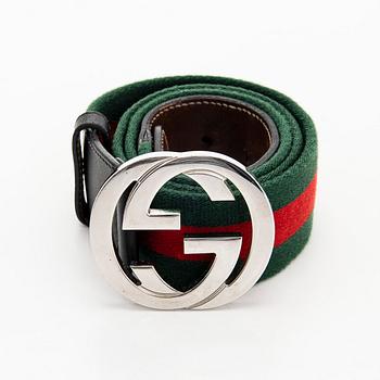 Gucci, A 'Verbier' scarf and a belt.