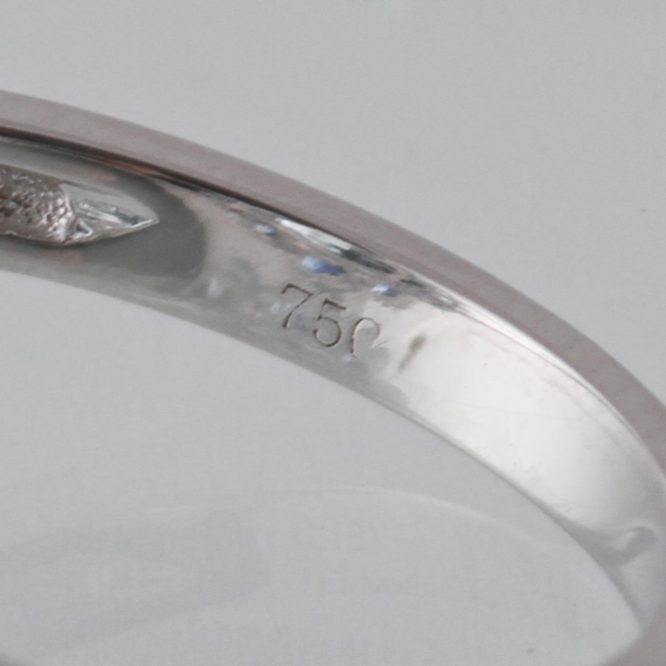 RING, 18K vitguld med briljantslipade diamanter ca 0.24 ct, blå safirer ca 2.05 ct samt topas ca 6.93 ct. Vikt 5,6 g.