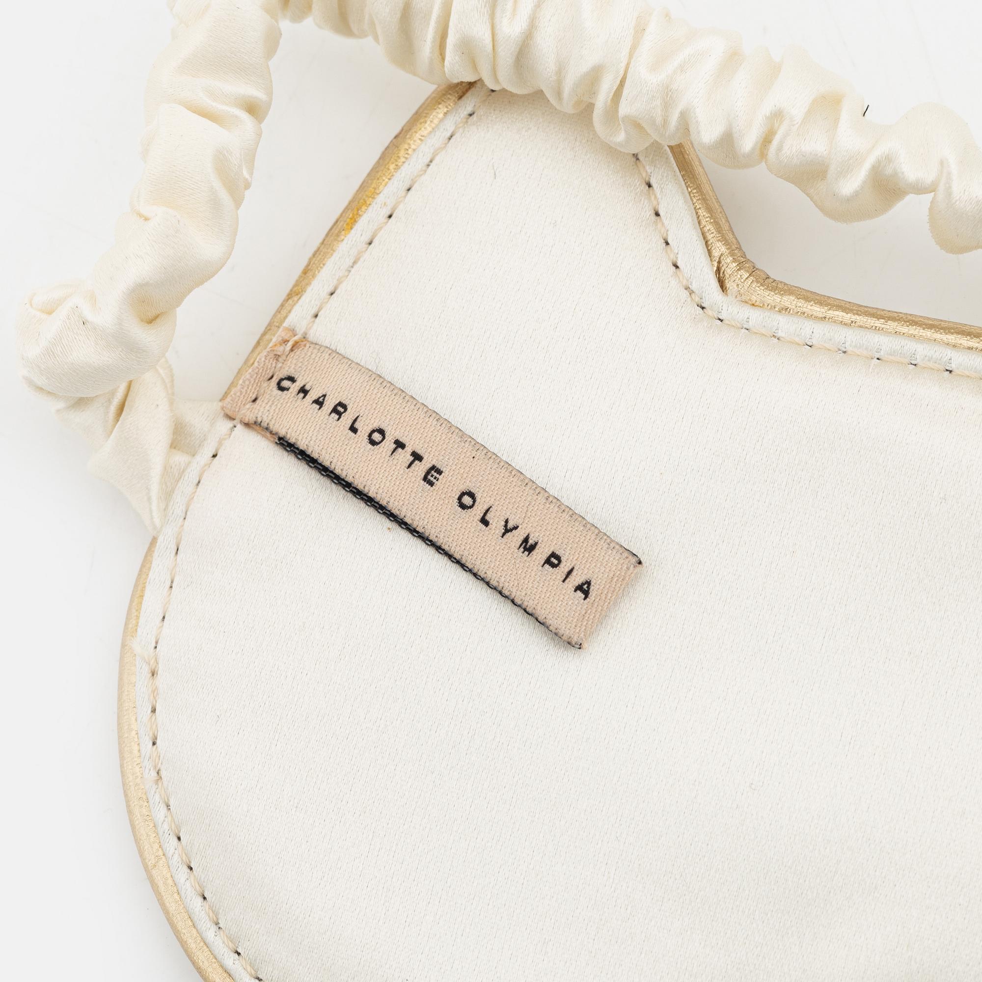 Charlotte Olympia, a pair of 'Cat nap' silk flats, a sleeping mask and a toilet bag, size S.