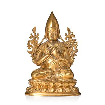 1007. A gilt bronze figure of Tsongkapa, Tibeto-chinese, 18th/19th Century.