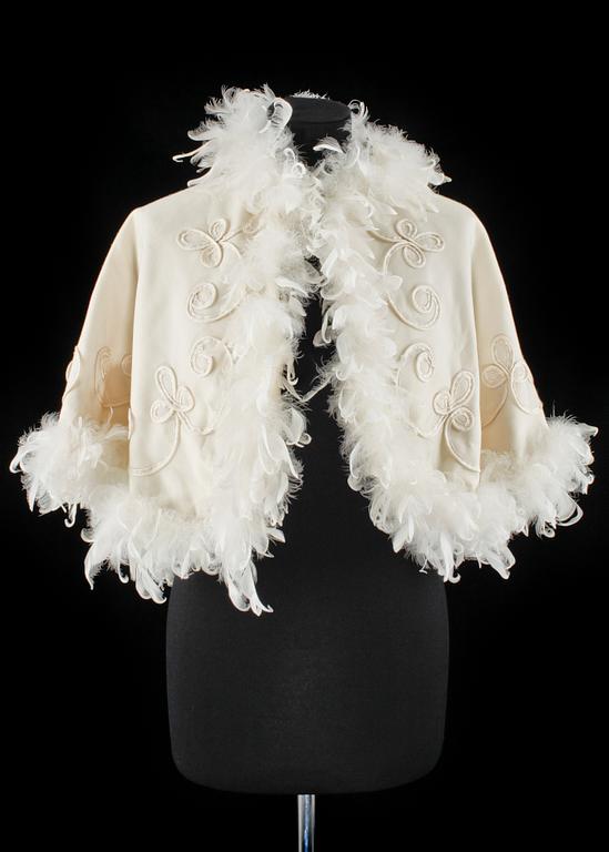 A cream colored silk wedding dress/evening dress by Mea.