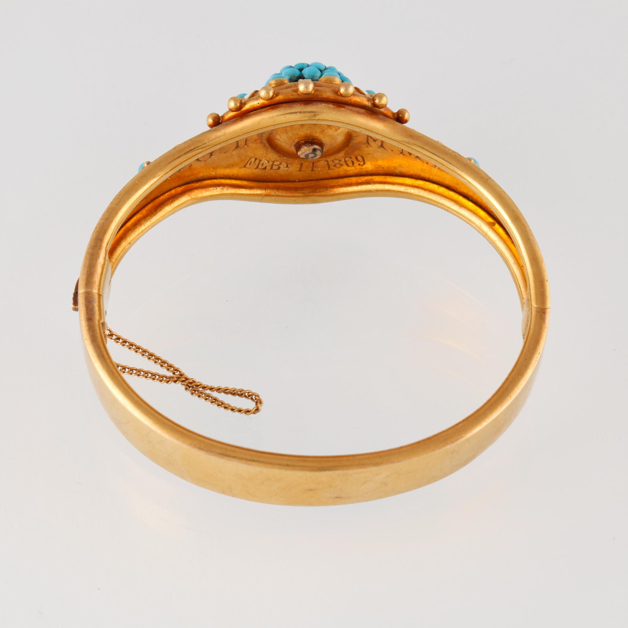 ARMBAND, 14K guld med turkoser och vit emalj. Vikt 28,8 gram.