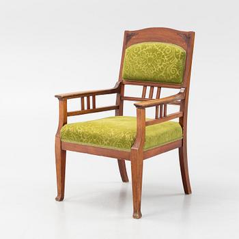 An Art Nouveau stained beech armchair, early 20th Century.