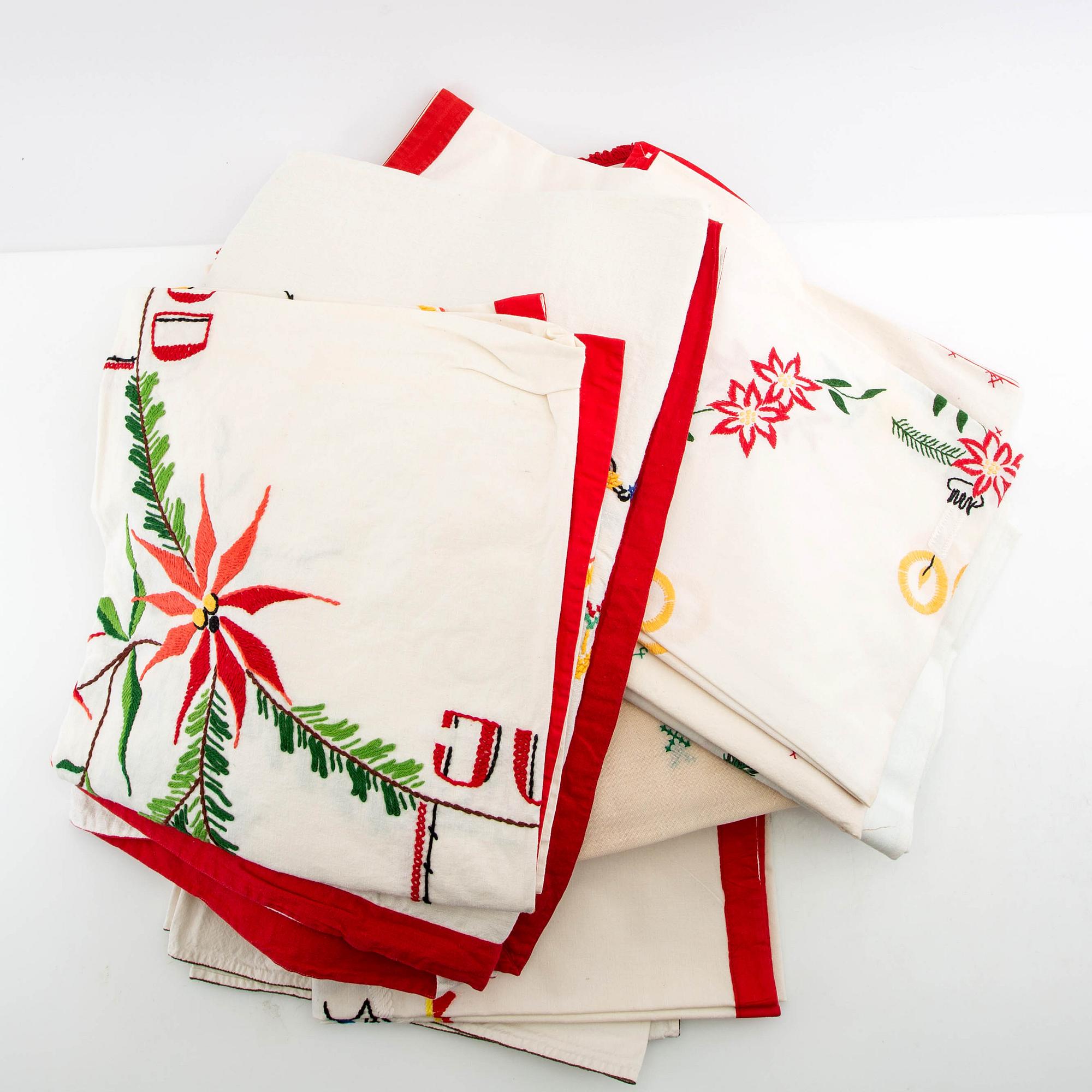A collection of Christmas tablecloths, 13 pcs in larger sizes, 20th century.