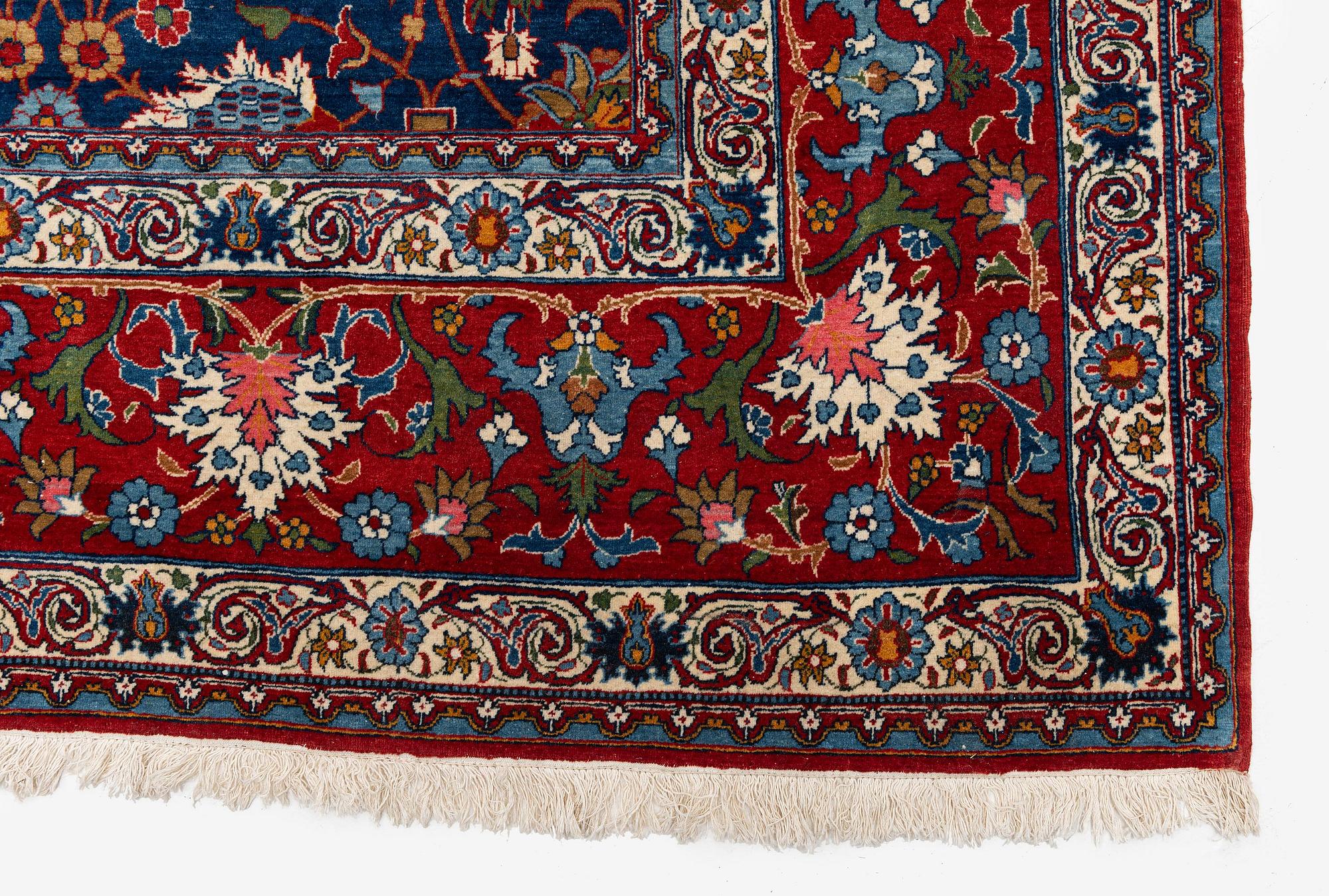 A semi-antique Qum carpet of Safavid design, Central Persia (Iran), c. 416 x 315 cm.