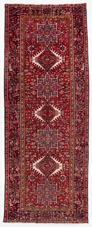 A semi-antique Karadja runner, c. 405 x 155 cm.