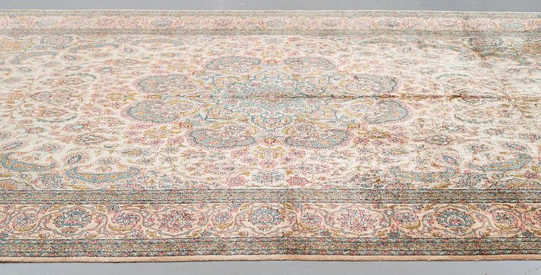 A CARPET, an old silk Turkey, ca 428 x 299-307 cm.