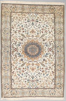 A carpet from Nain, Nain, part silk, 9 LAA, around 310 x 210 cm.