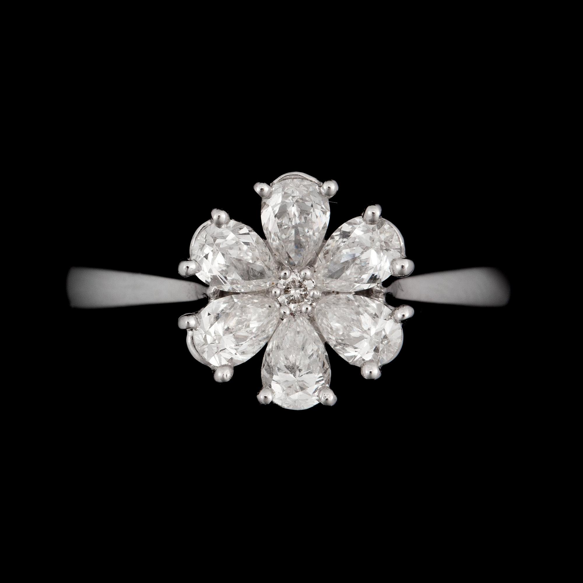 A diamond, circa 0.86 ct in total, ring.