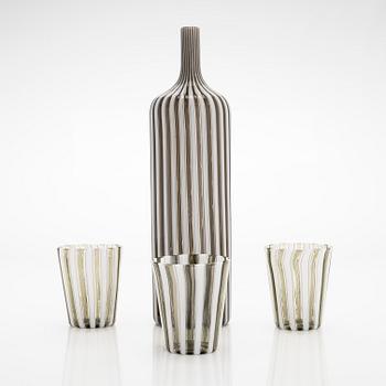 Gio Ponti, a glass bottle '4500' signed Venini, Murano and three drinking glasses, Italy.