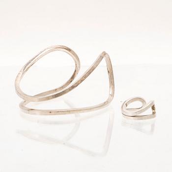 A silver ring and bracelet "loop cuff" by Efva Attling.
