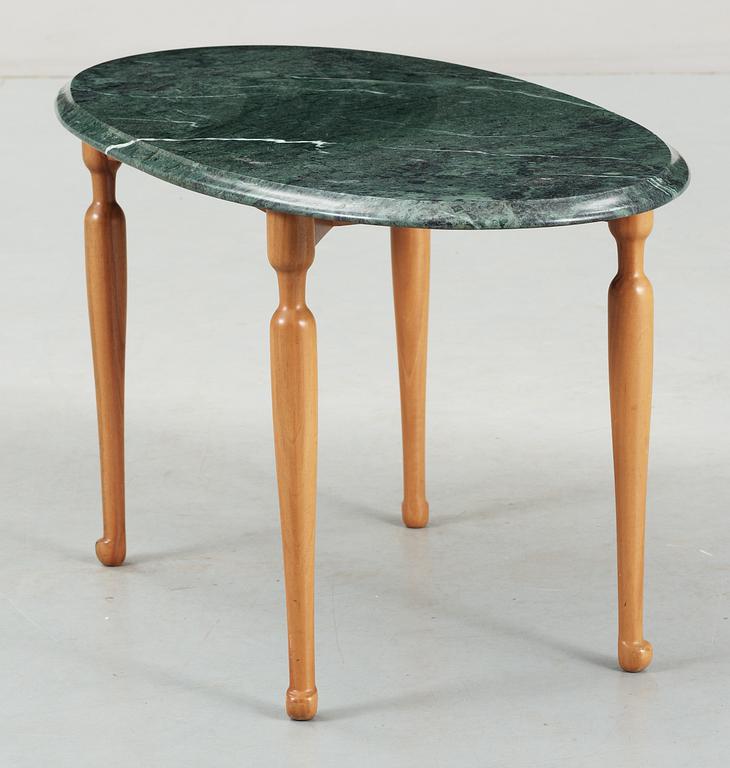 A Josef Frank green marble top table and mahogany by Svenskt Tenn.