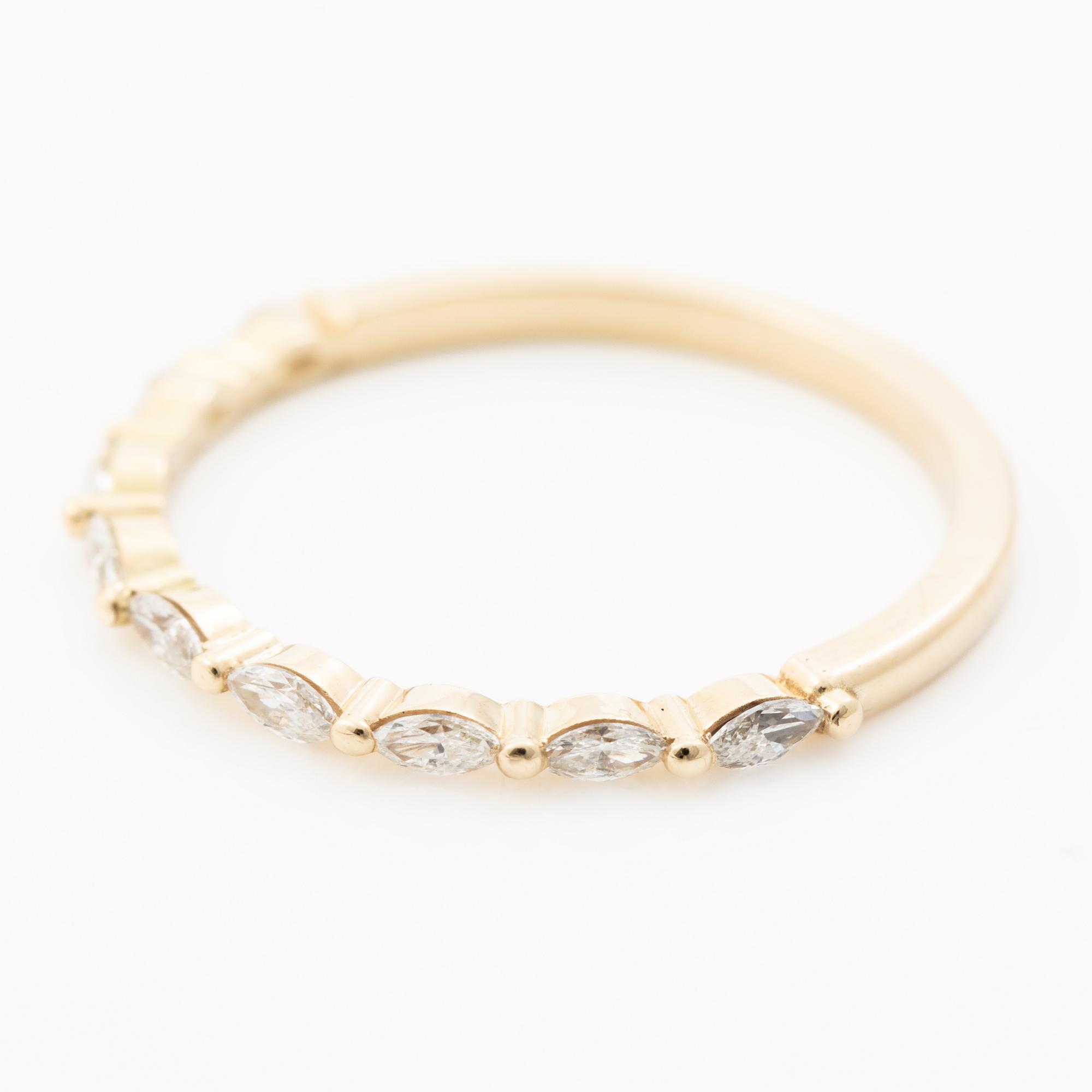 14K gold ring with marquise-cut diamonds.