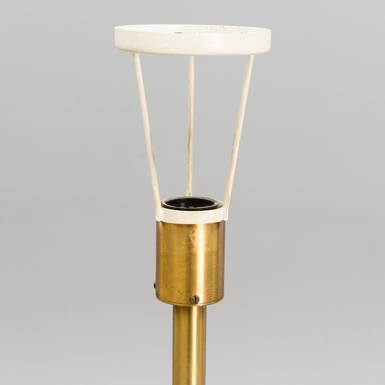 A 1970's floor lamp by Kai Ruokonen for Orno, Finland.