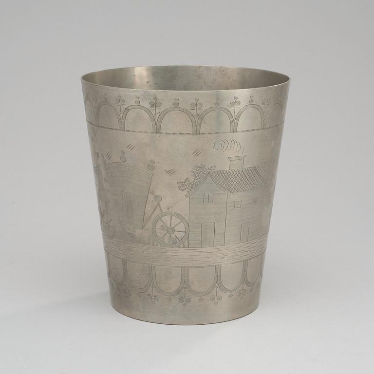 A Svenskt Tenn engraved pewter cup, Stockholm 1943, model 1010.