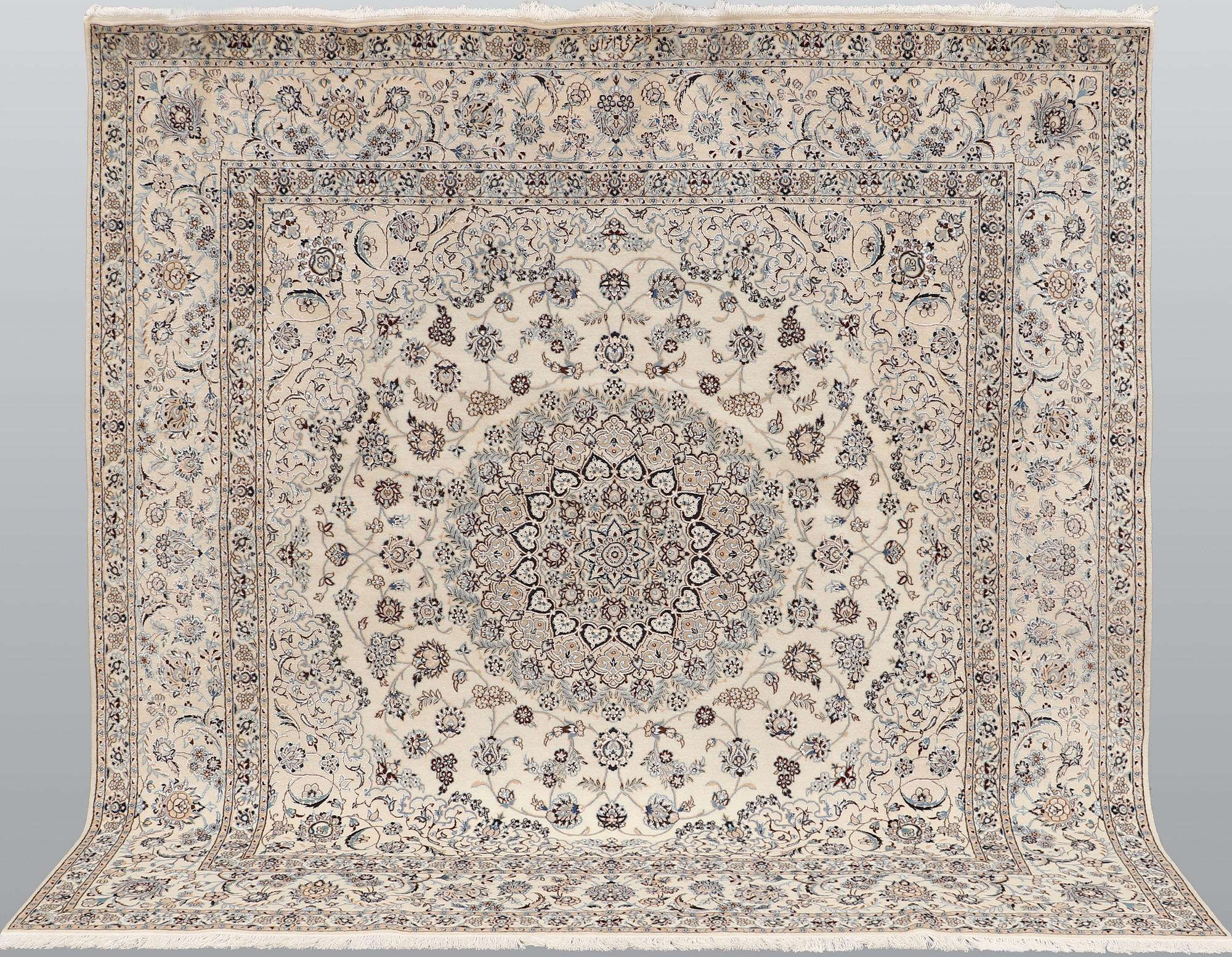 A Nain part silk carpet, 210 x 200 cm.