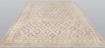 A kilim carpet, ca 290 x 208 cm.