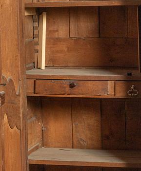 A french carved wooden cabinet, around 1900.