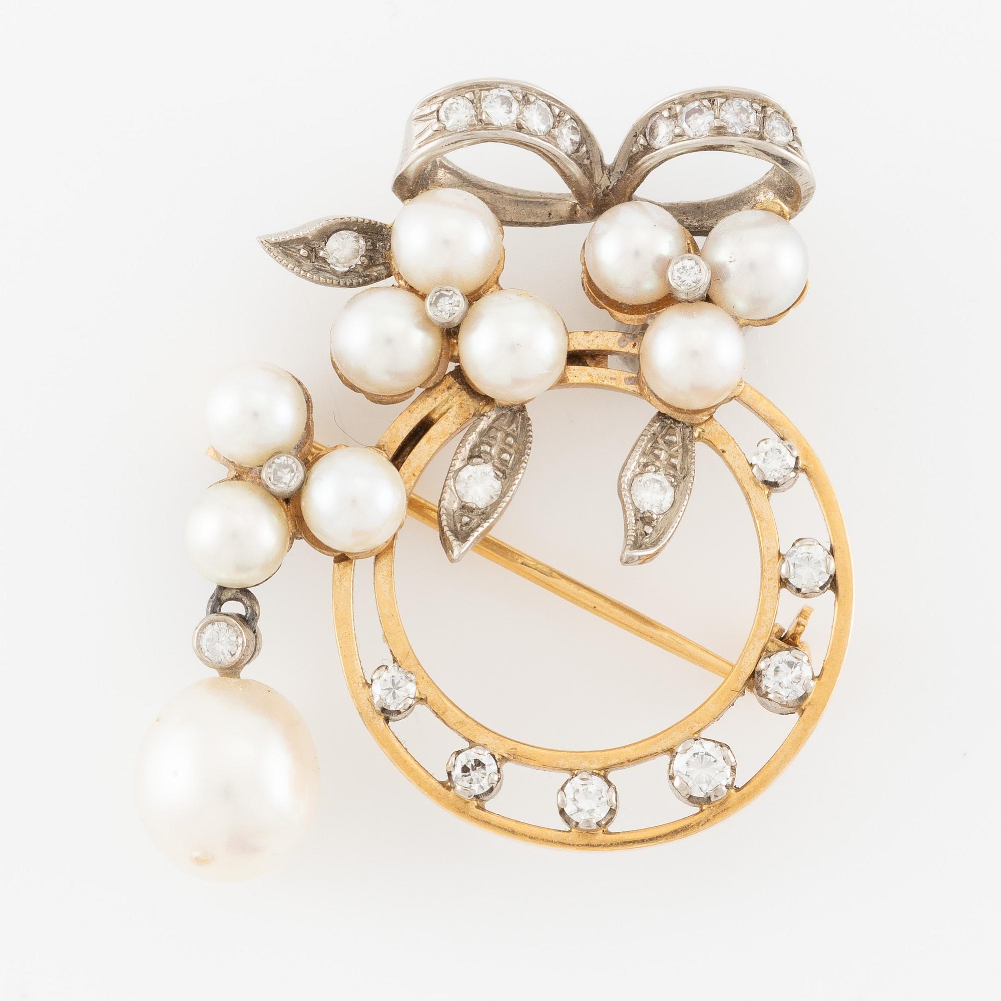 Brooch, K. Torndal, 18K gold with pearls and brilliant-cut diamonds, clasp with larger pearl.