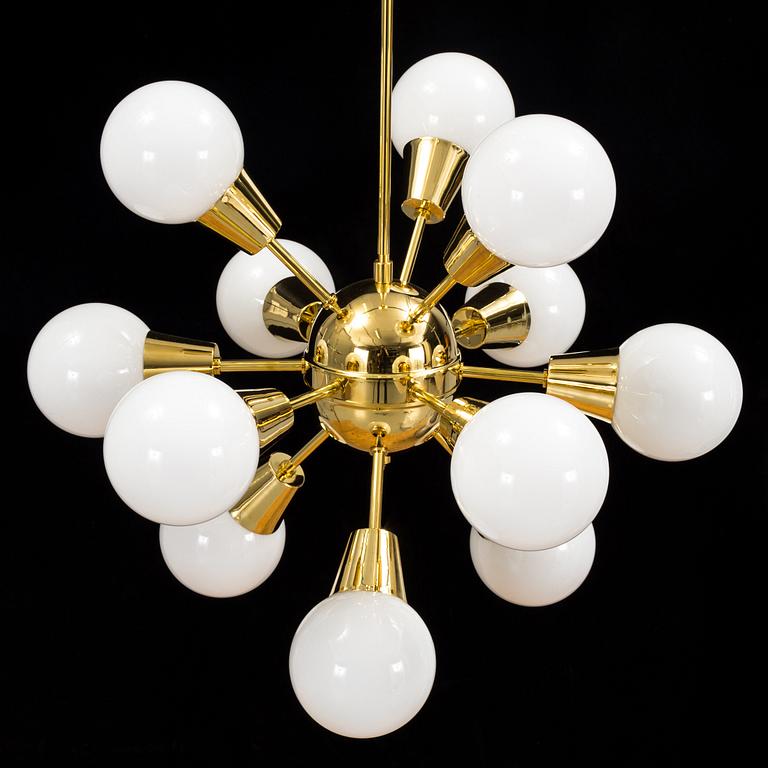 a brass and glas "Sputnik"-model ceiling light from the second half of the 20th century. Height ca 100 cm.