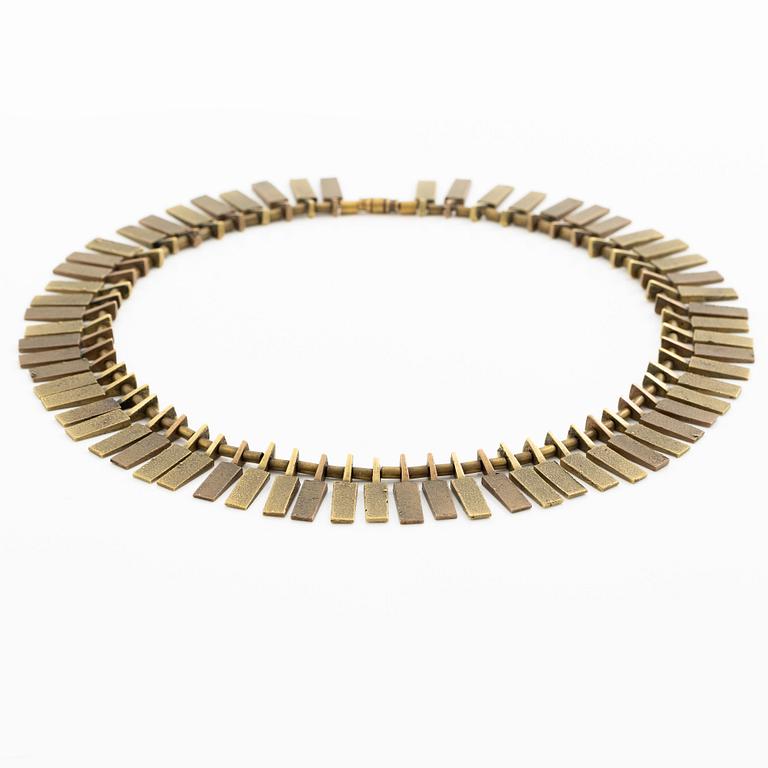 Inga-Britt "Ibe" Dahlquist, a necklace "Nefertiti", bronze.
