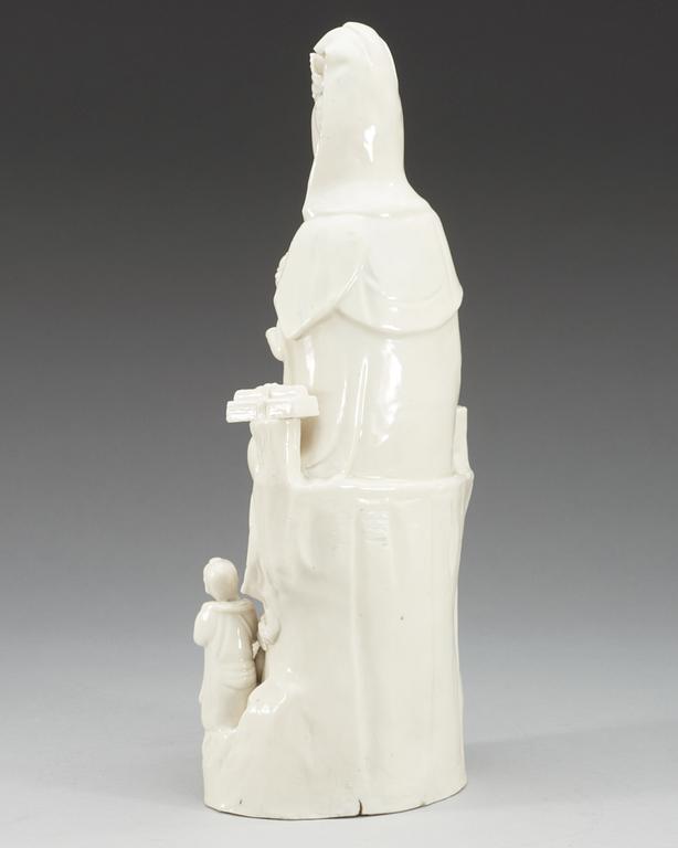 A blanc de chine figure of a seated Guanyin, Qing dynasty, 18th Century.