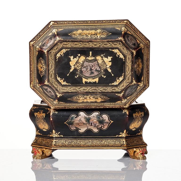 A Chinese lacquered tea caddy with pewter boxes, Qing dynasty, 19th Century.