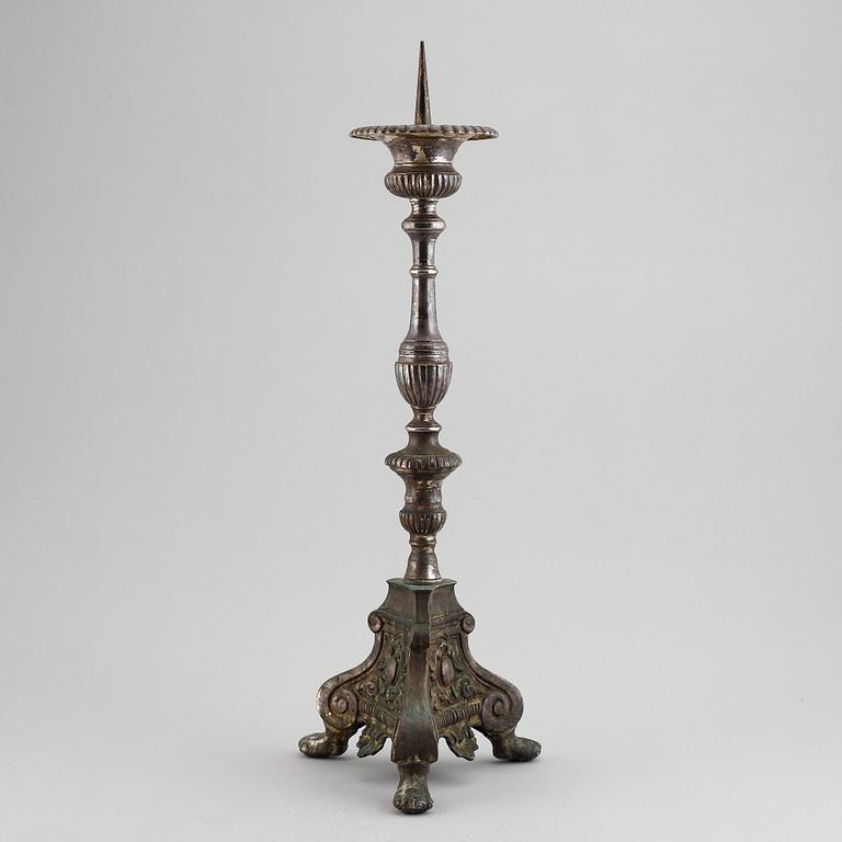 An 18th century bronze candlestick.