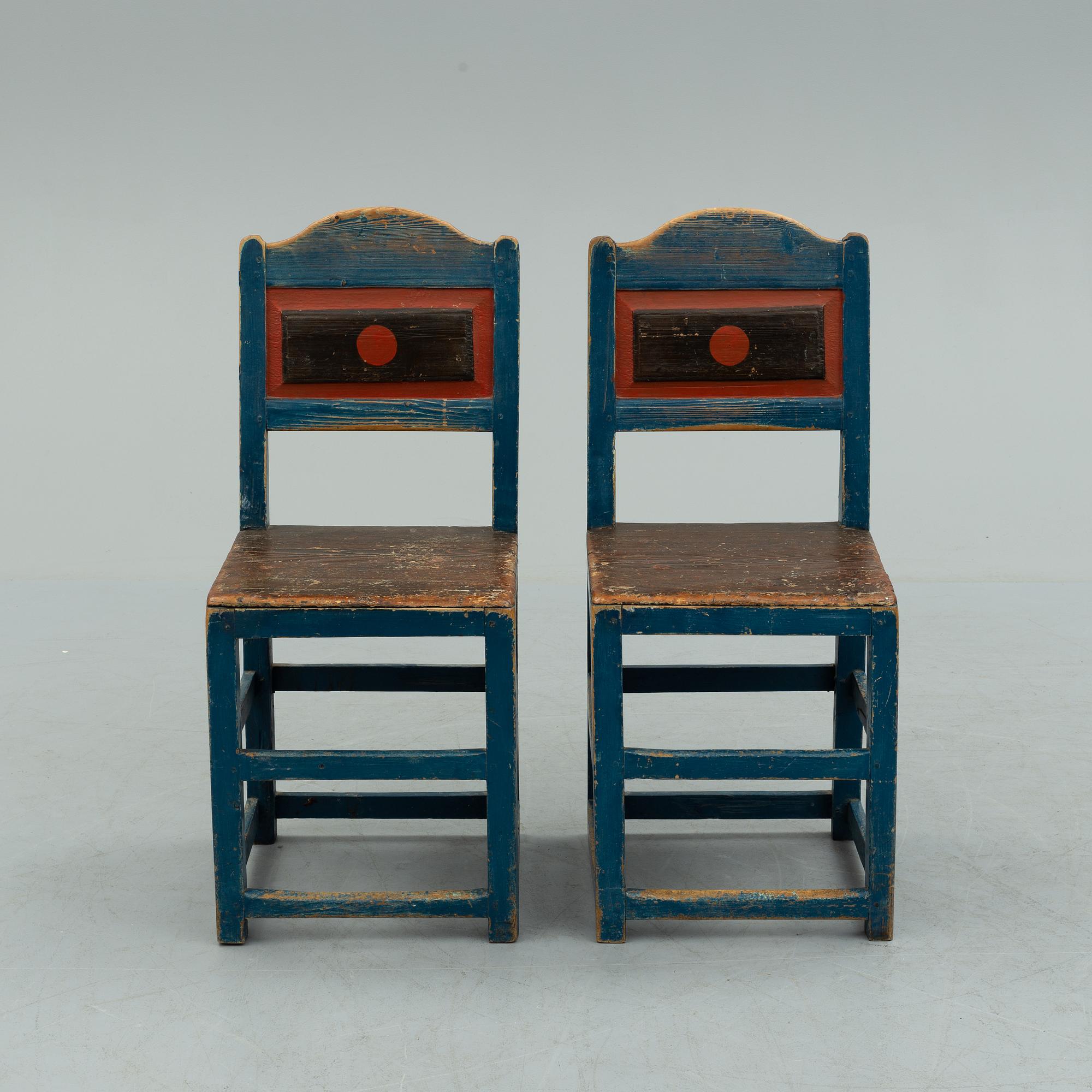 a pair of early 20th century chairs.